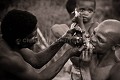 Bushmen Hunters eating together