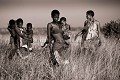 Bushmen looking for food in the bush