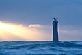 Nividic Lighthouse. Storm waves.