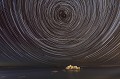 Filé d'étoiles autour de l'étoile Polaire - circumpolaire- au-dessus du Fort National de Saint-Malo à marée haute, la nuit, lors d'une grande marée d'équinoxe. Bretagne.
Durant la prise de vue qui a duré plusieurs heures, un météor est passé tout près de l'étoile polaire laissant un trait droit.

 Fort National 
 Saint-Malo 
 astronomie 
 ciel 
 espace 
 météor 
 night 
 nocturne 
 nuit 
 paysage nocturne 
 polaire 
 sky 
 stars 
 étoiles 