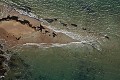 Photo aérienne verticale d'un détail de la côte de Granite Rose. Côtes d'Armor. Bretagne. France.
Marée descendante.
 mer 
 marée 
 Bretagne 
 Côte 
 granite rose 
 plage 
 sable 
 eau 
 vert 
 émeraude 
 vagues 
 photo 
 détail 
 France 
 photo aérienne 