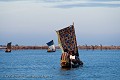 Bateau sur la cité lacustre de Ganvié. Bénin. Afrique 
 femme 
 Bénin 
 lagune 
 Ganvié 
Africa
boat
bateau
voile
 