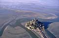 Baie classée Patrimoine Mondial de l'Humanité par l'UNESCO.
Normandie - France. Mont Saint Michel Baie marée basse vue aérienne Normandie France littoral UNESCO Manche patrimoine mondial humanité 