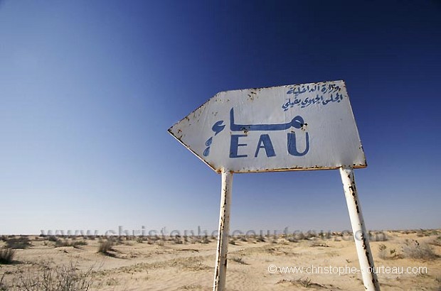 Road Sign in the Sahara desert : Means : 