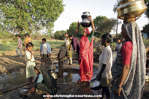 Water chore for women and young girls in India.